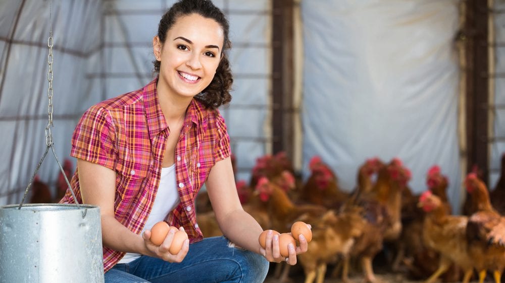 woman with chickens